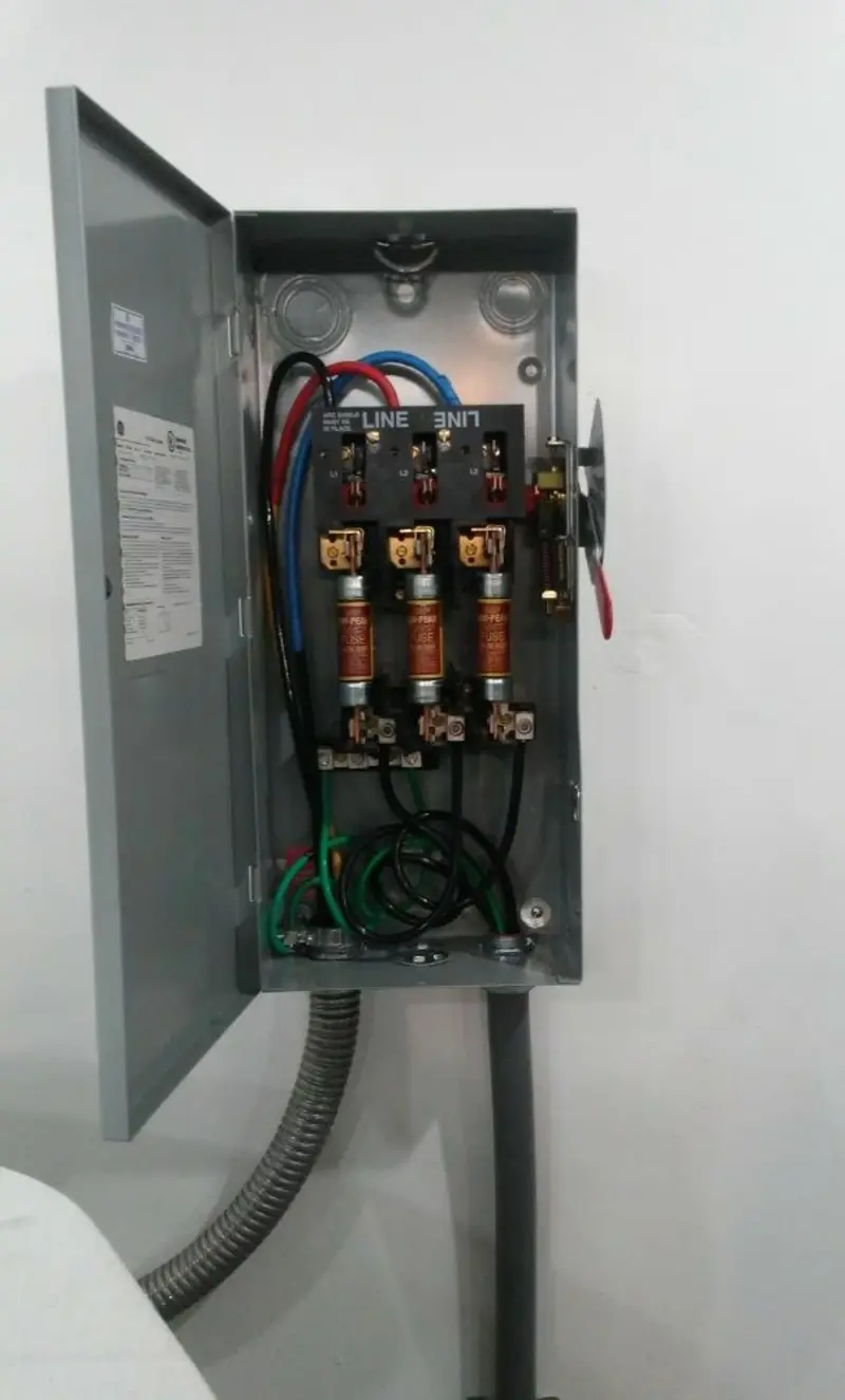 Three-phase disconnect switch installed for Smoke Detector Installation in Great Bend