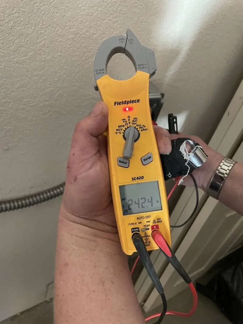 Voltage testing with clamp meter during Hot Tub / Pool Electrical Wiring in Great Bend